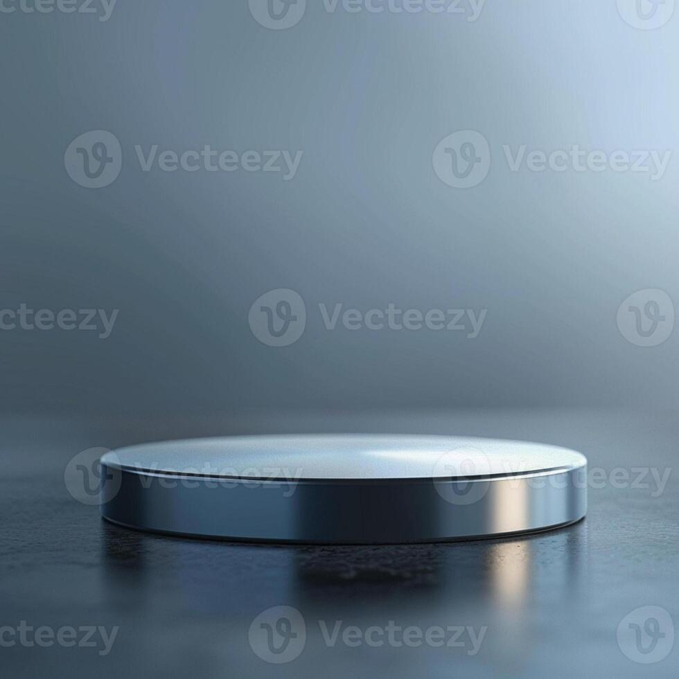 A silver object on a table with a blue background photo