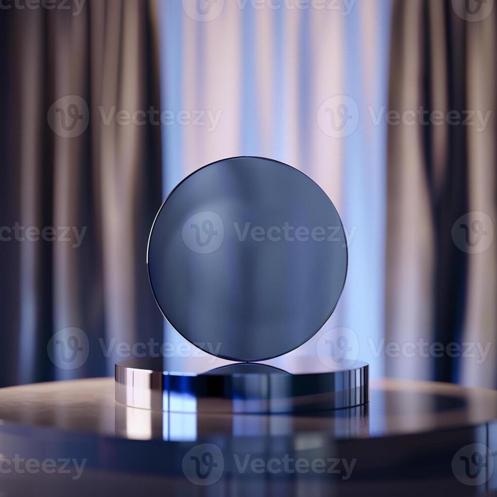 A glass trophy on a pedestal in front of a curtain photo