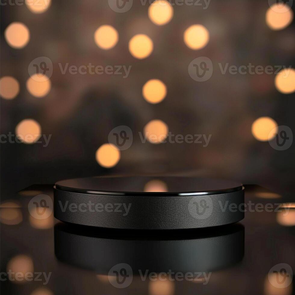 A black object sitting on a table in front of a blurred background photo