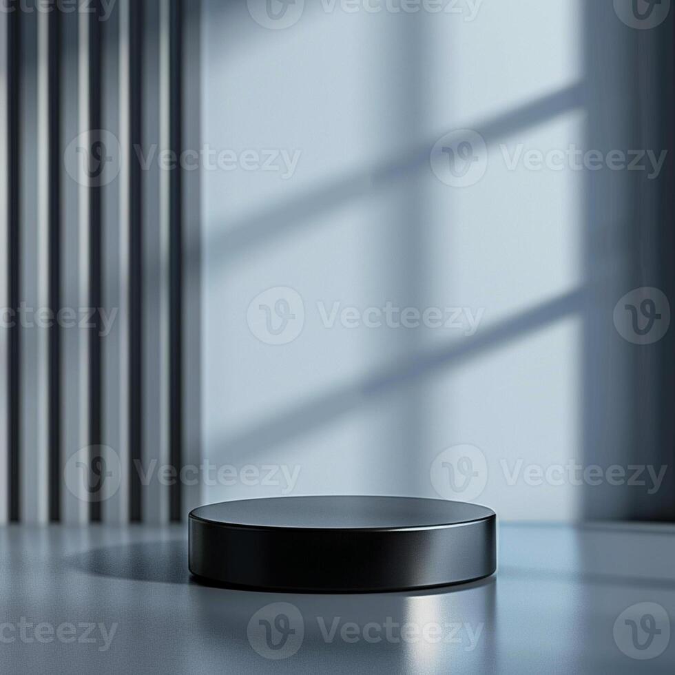 A black round object on a table in front of a window photo