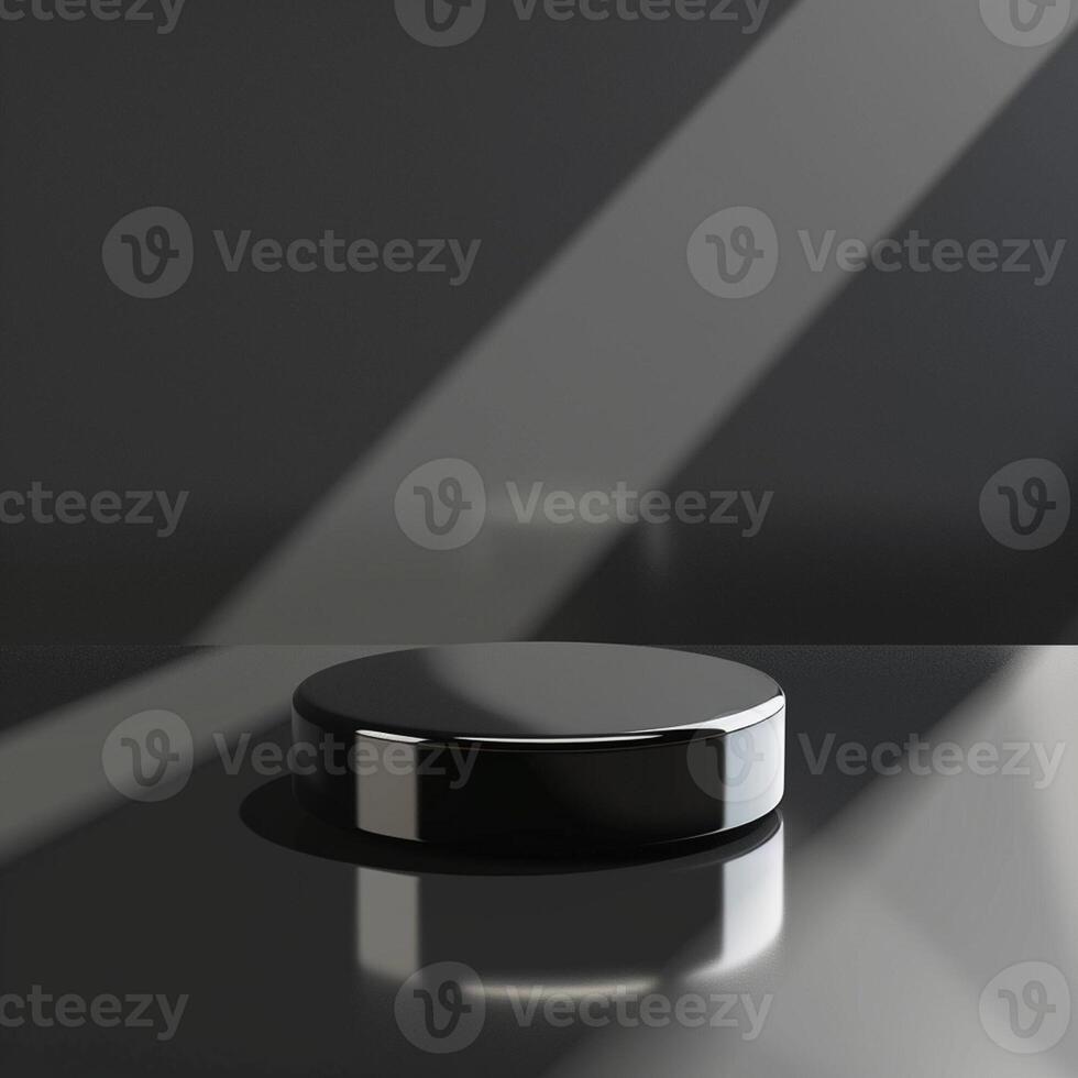 A black round object on a table with a shadow photo