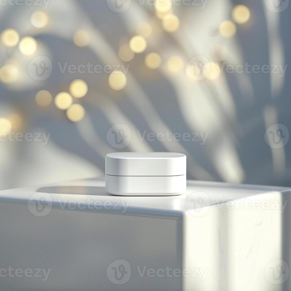 A white box sitting on a table with lights behind it photo