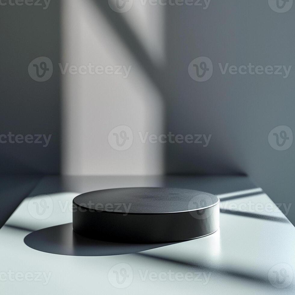 A black object on a table in front of a window photo