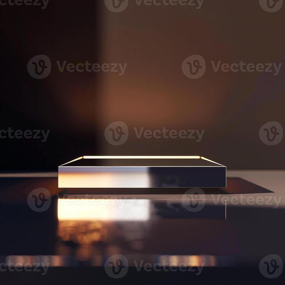 A square shaped object on a table with a light shining on it photo