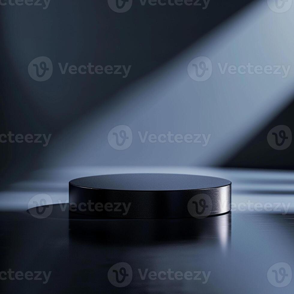 A black round table with a spotlight shining on it photo