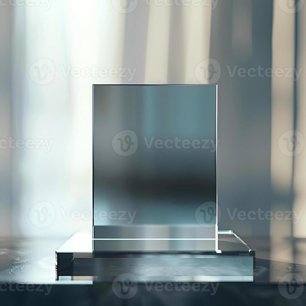 A glass award on a table with a blurred background photo