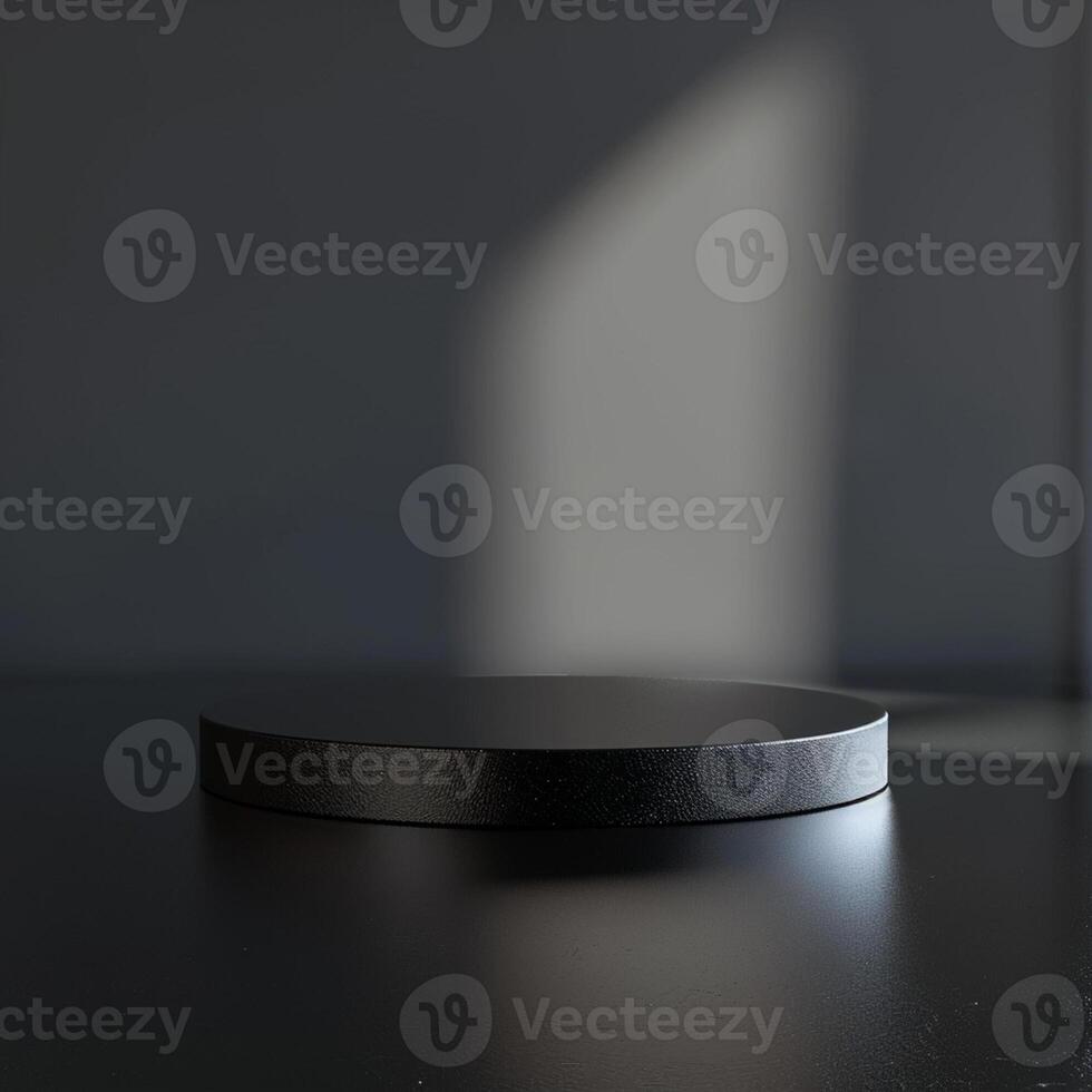 A black round table on a table with a shadow photo