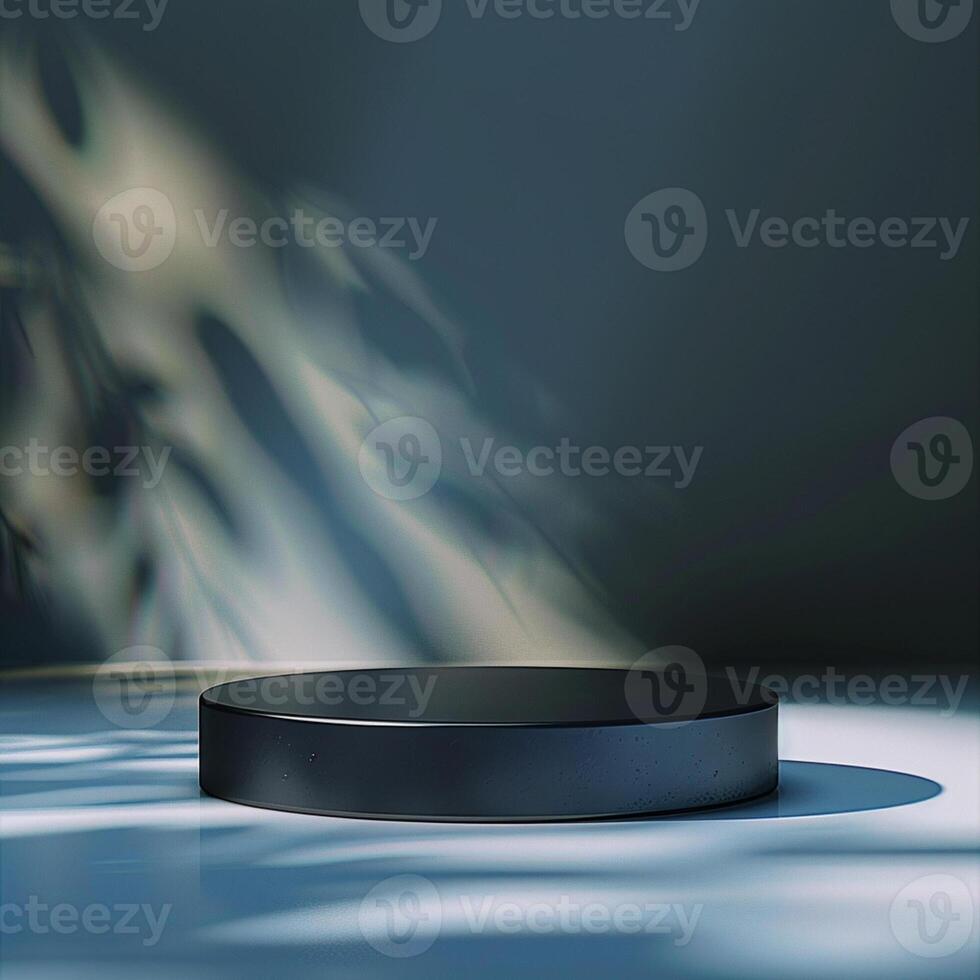 A black round table with a shadow on it photo