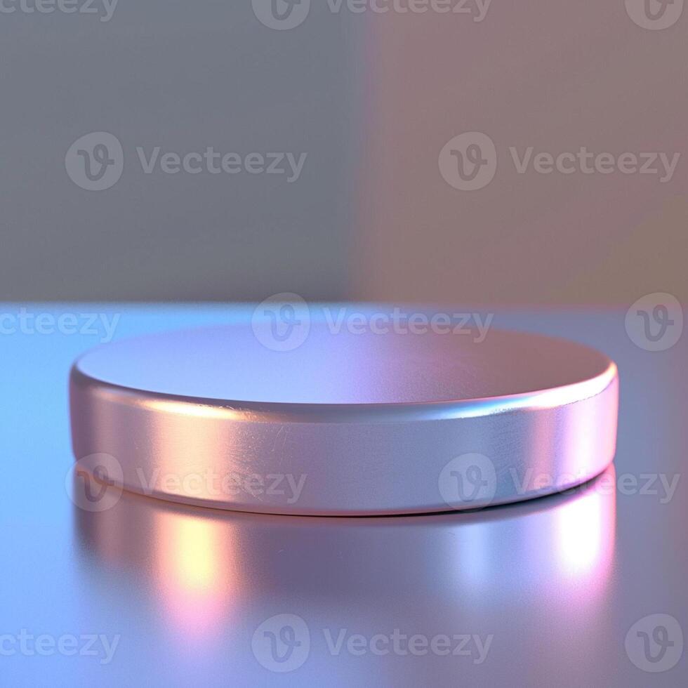 A silver object sitting on a table with a blue background photo