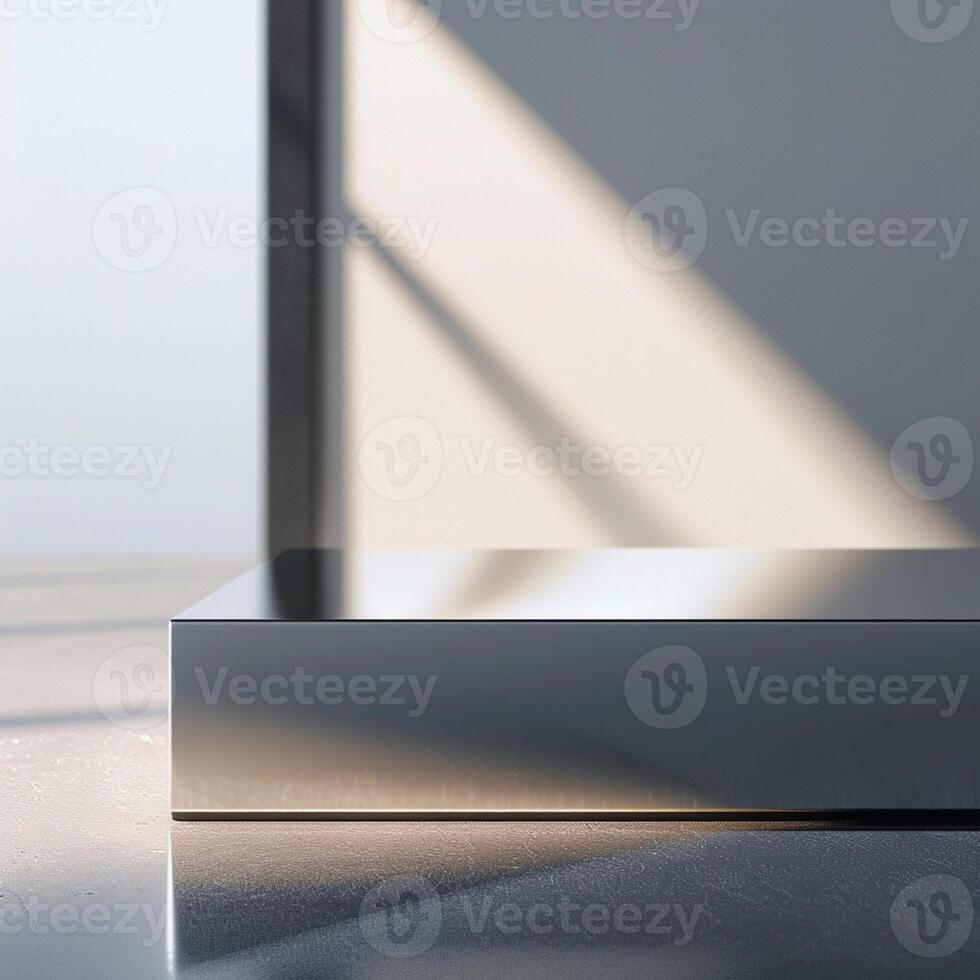 A modern metal table in front of a window photo