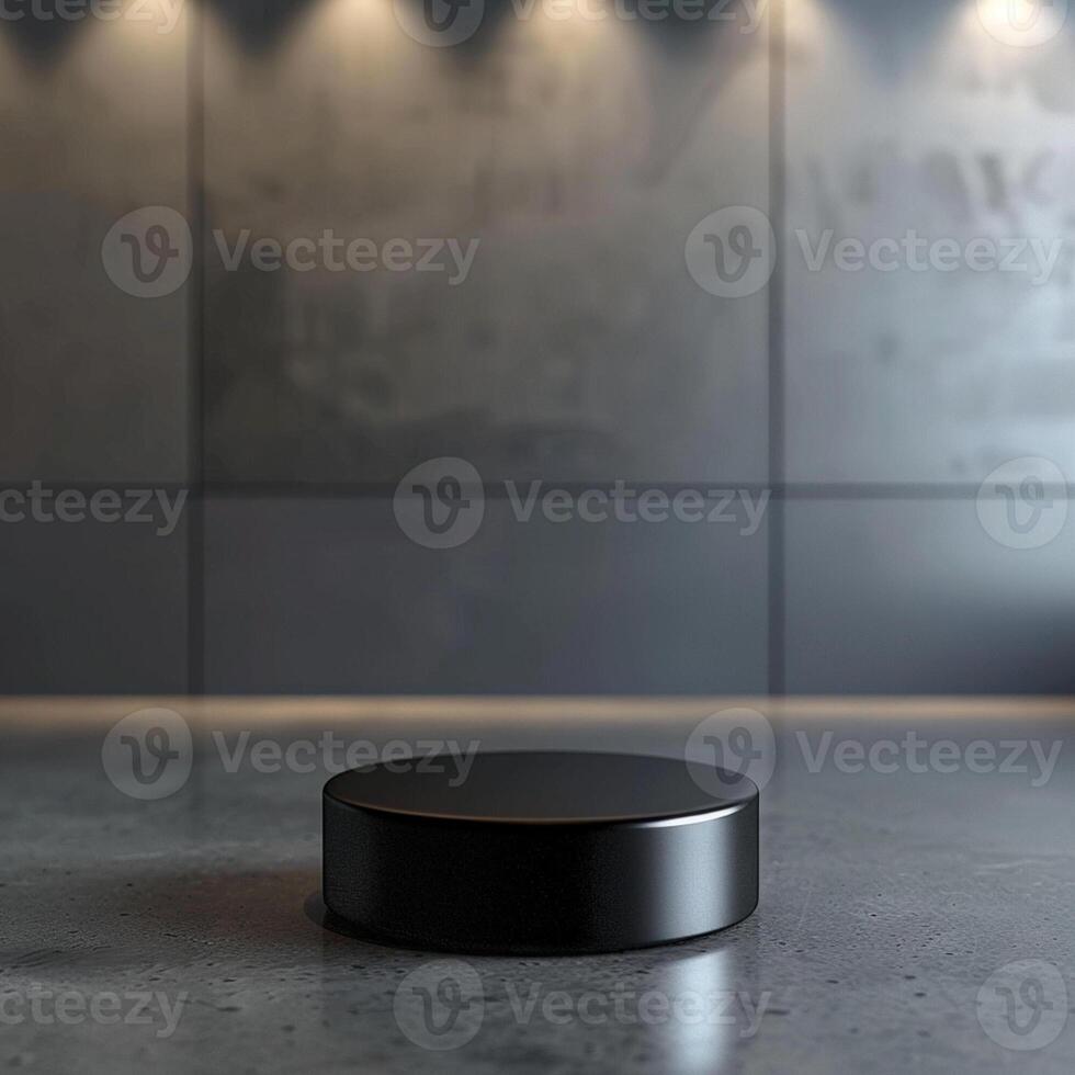 A black round object sitting on a concrete floor photo