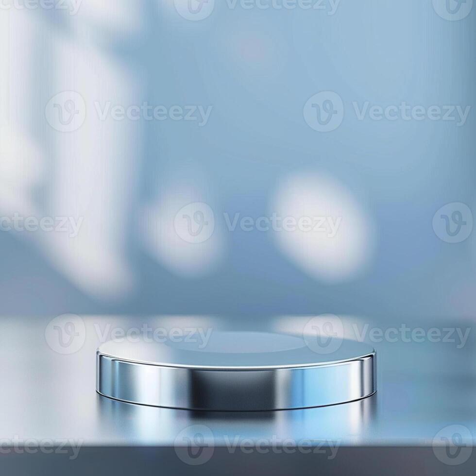 A silver object on a table with a blue background photo