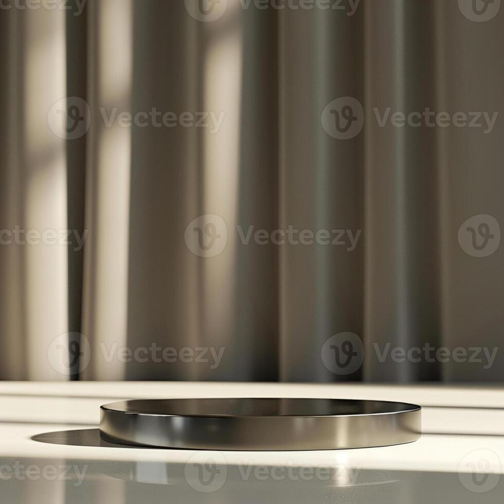 A round metal plate on a table in front of a curtain photo