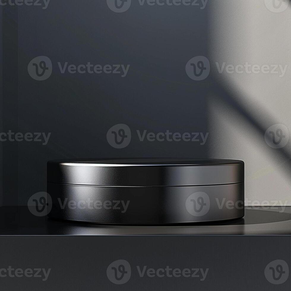 A black box sitting on a table in front of a window photo