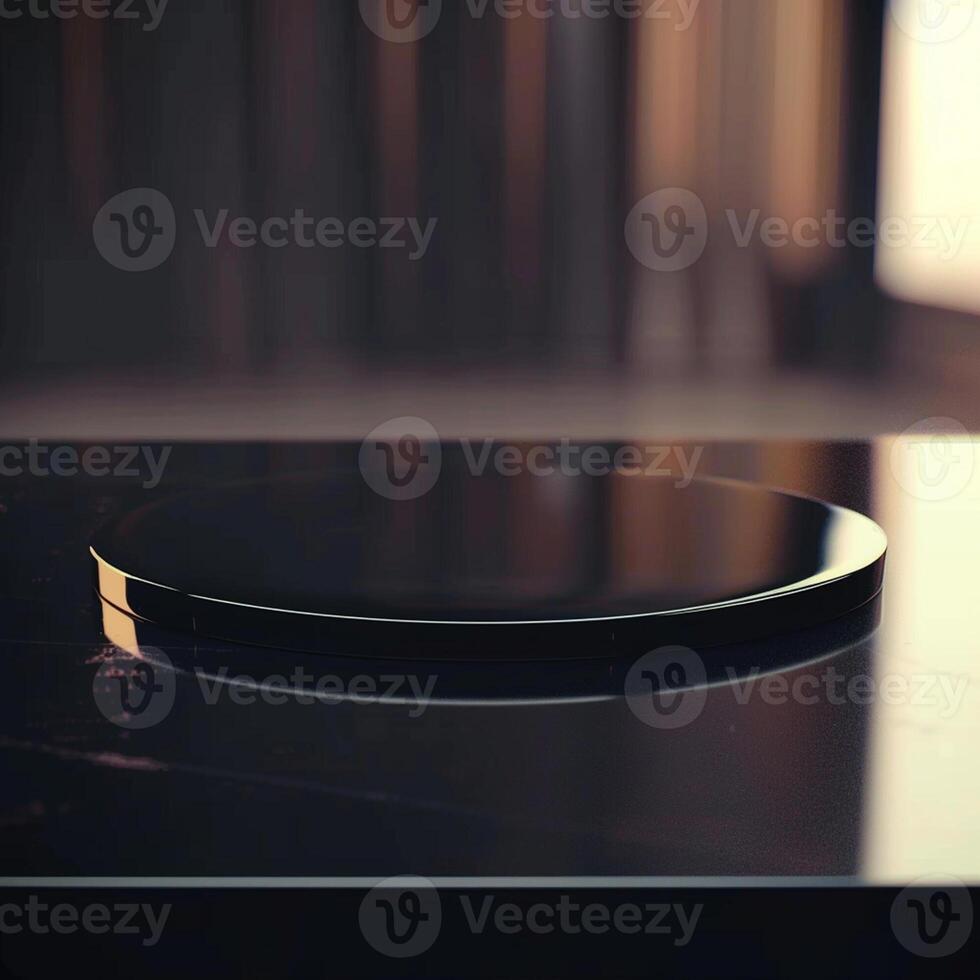 A black plate on top of a table photo