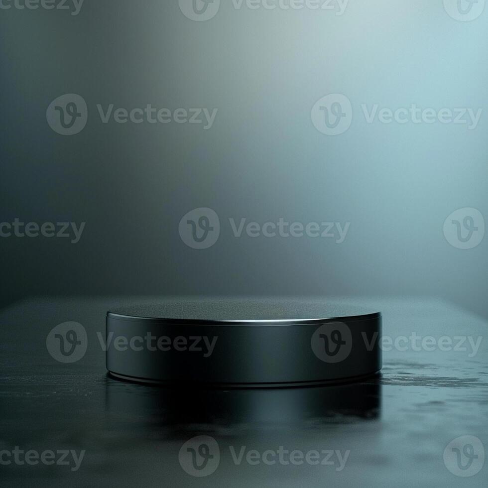 A black object sitting on a table in front of a dark background photo
