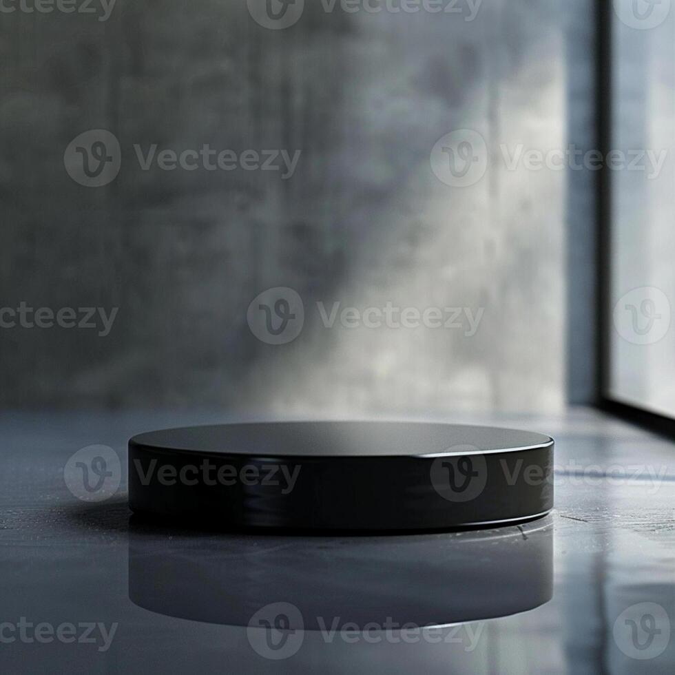 A black circular object sitting on a table photo
