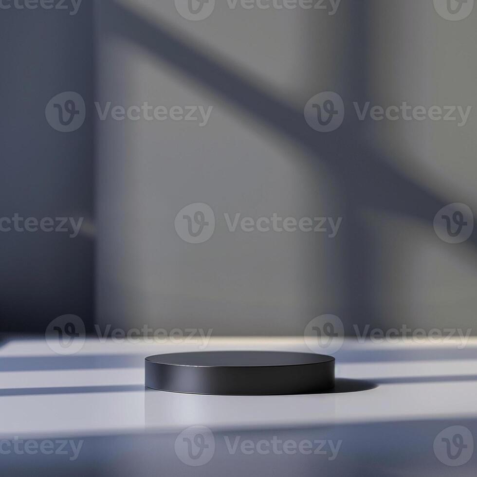 A black round object on a table in front of a window photo