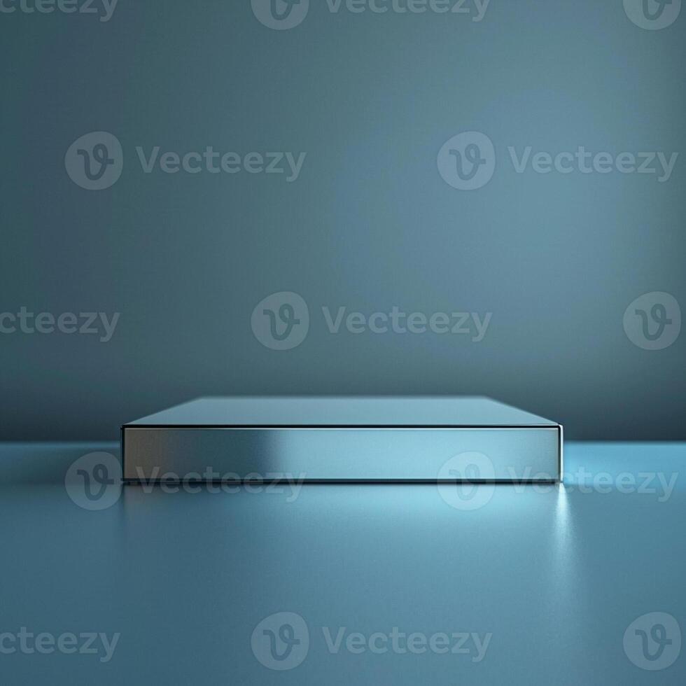 A blue box sitting on a table in front of a wall photo