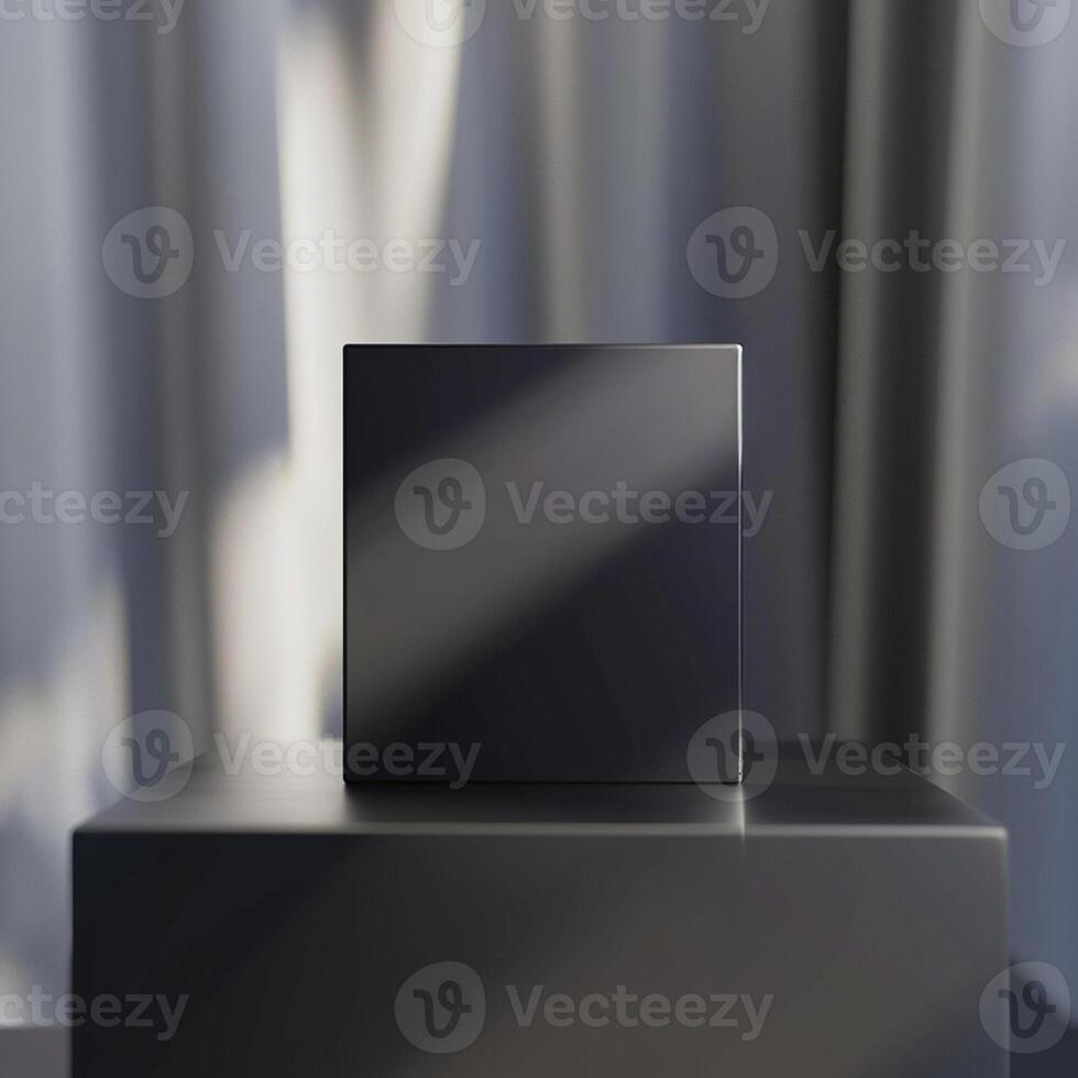 A black square box sitting on top of a table photo
