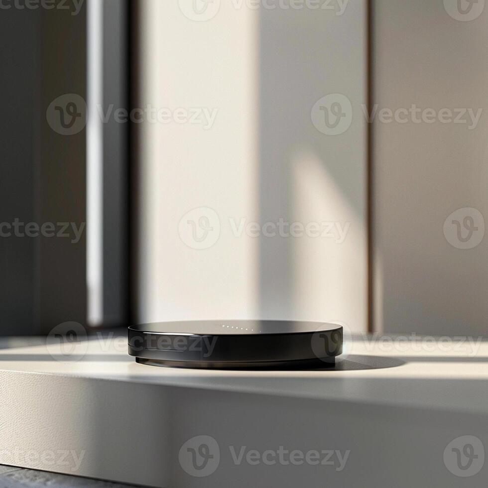 A black and white device sitting on a table photo
