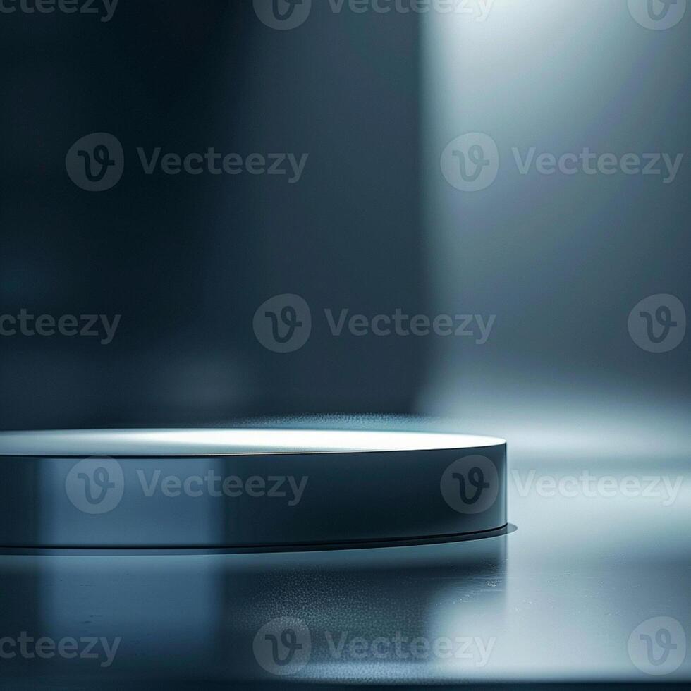 A white circular object on a table in front of a dark background photo