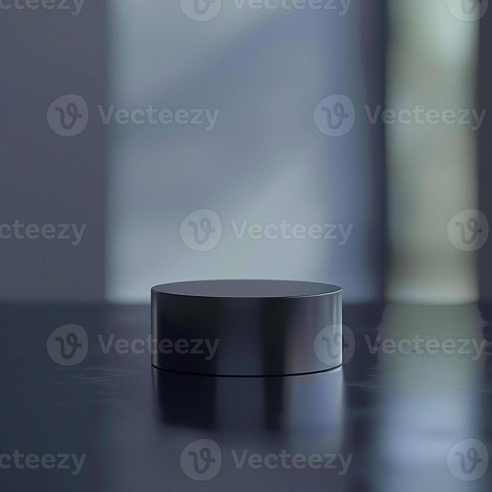 A black cylinder sitting on a table photo