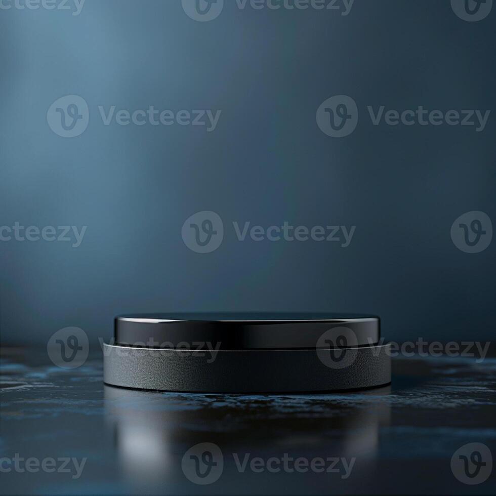 A black object on a table with a blue background photo