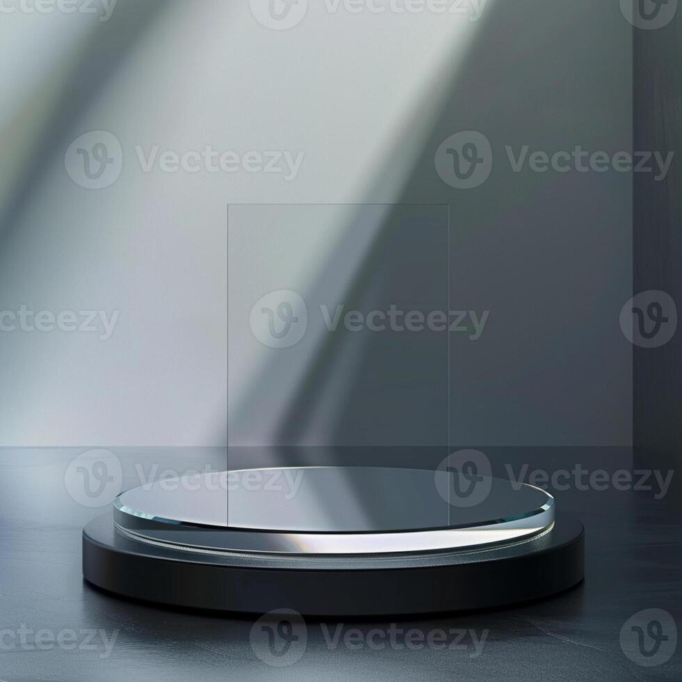 A glass display stand on a table in front of a wall photo
