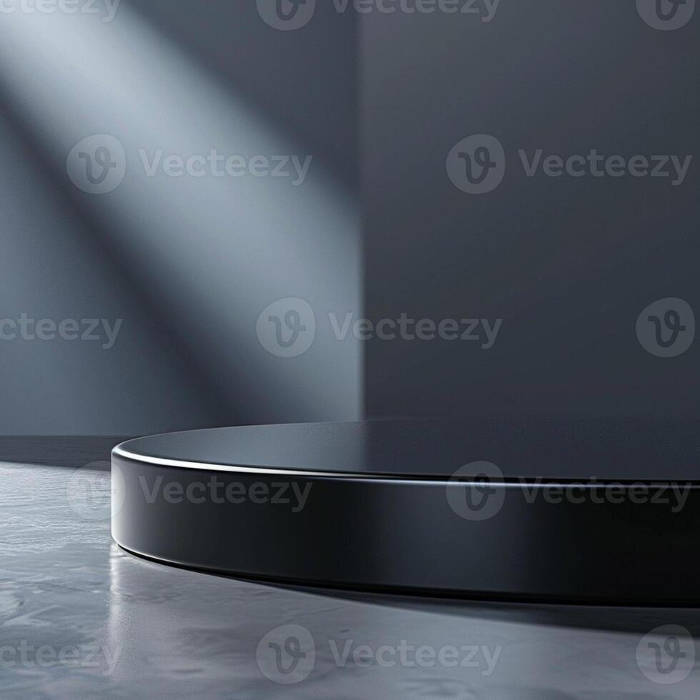 A black round table with a light shining on it photo