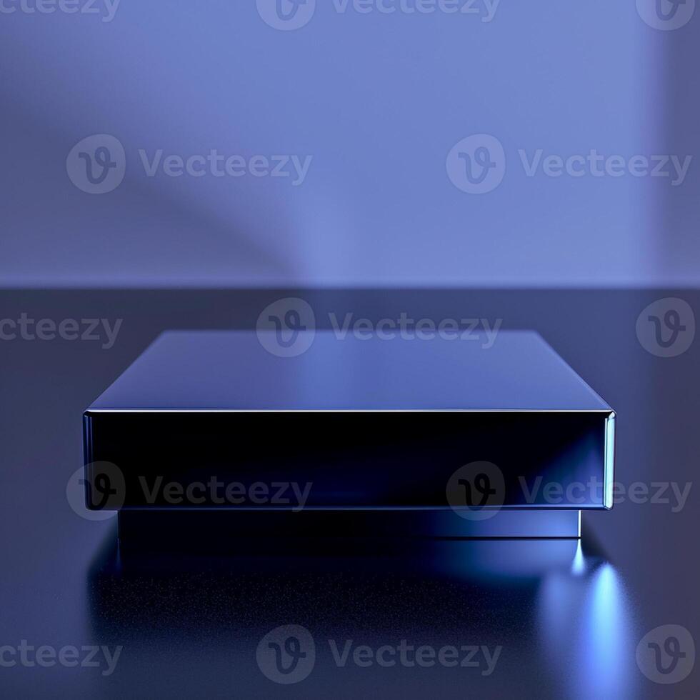 A blue box sitting on a table in front of a blue wall photo