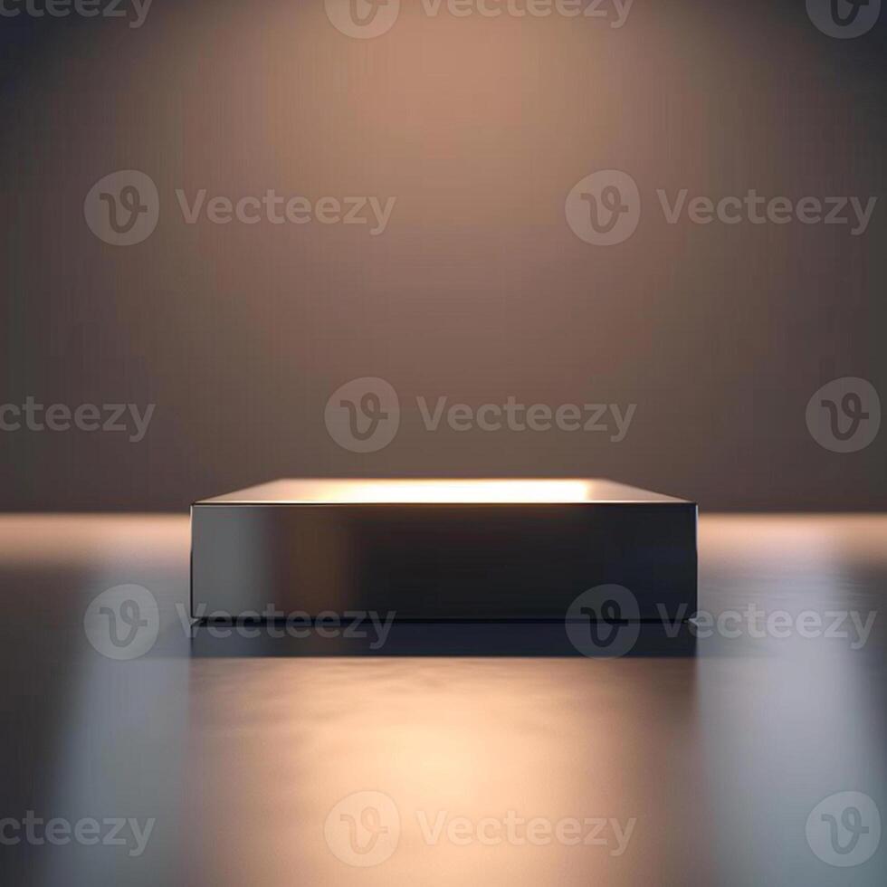 A square box sitting on a table in front of a light photo
