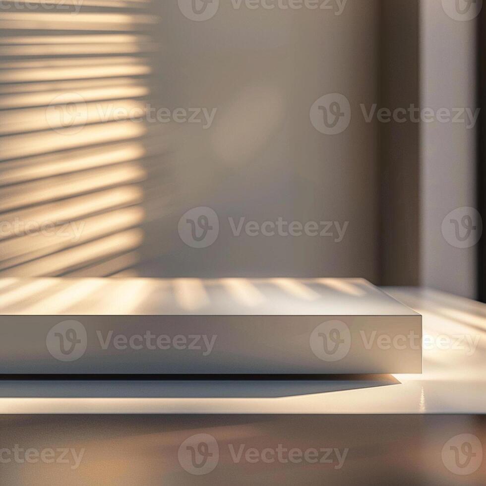 A white box sitting on a table in front of a window photo