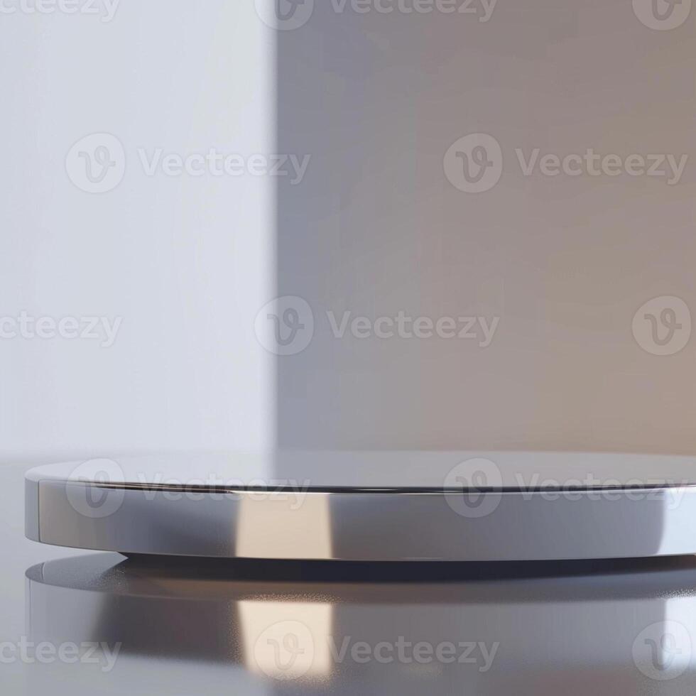 A modern looking silver plate on a table photo