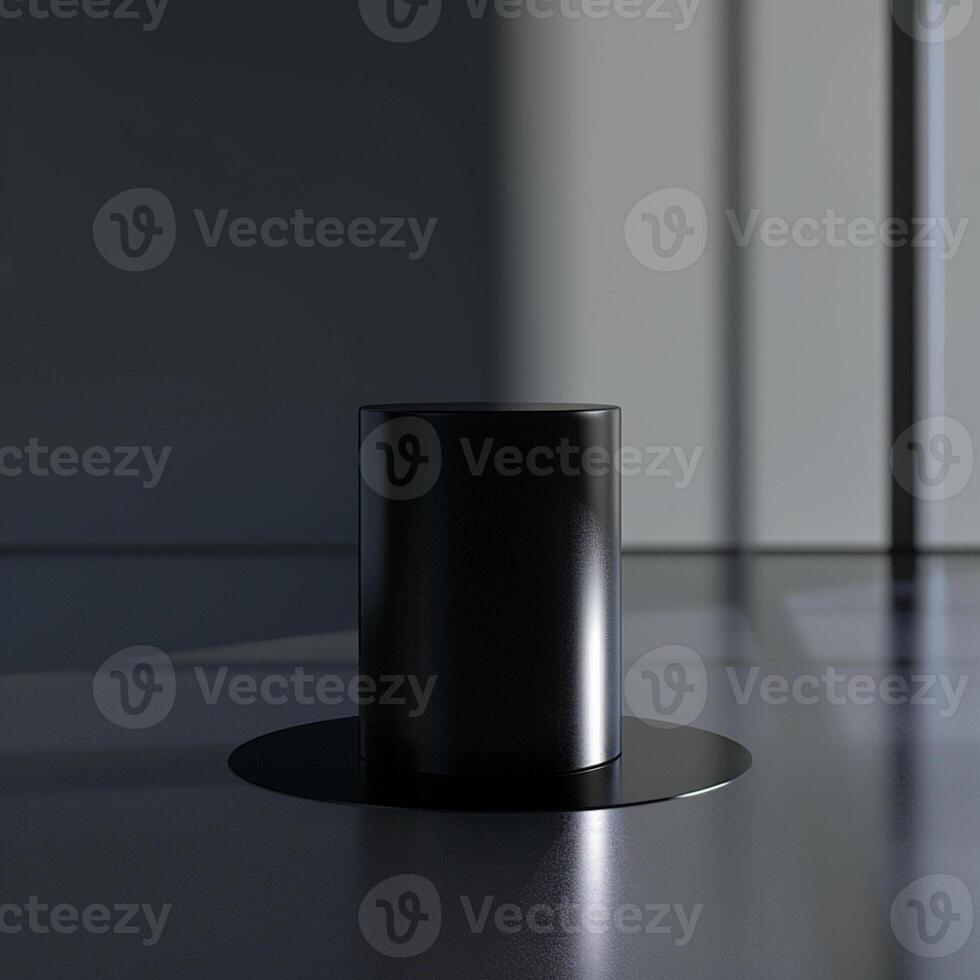 A black cylinder sitting on a table in a room photo