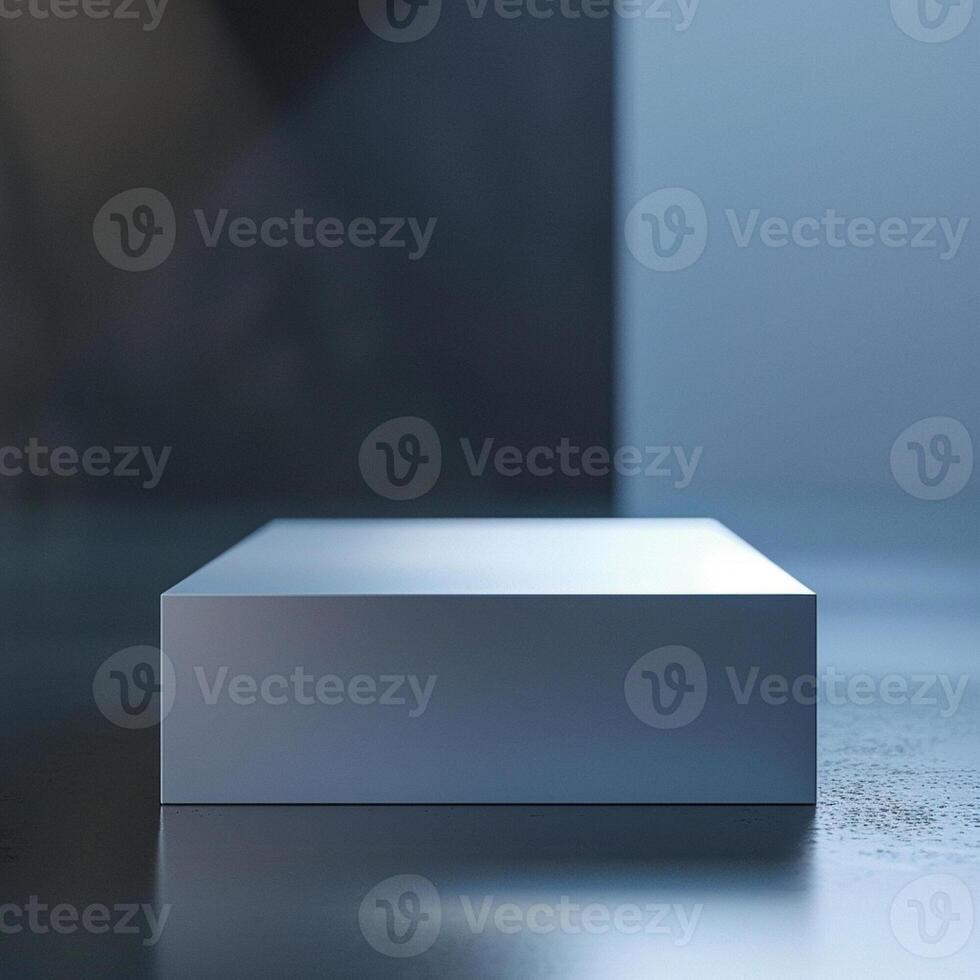 A white box sitting on a table in front of a wall photo
