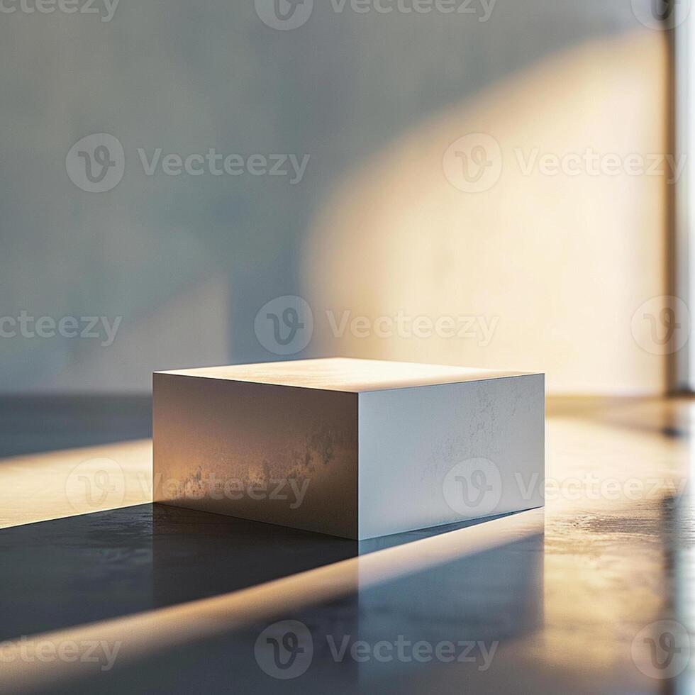 A white cube sitting on a concrete floor photo