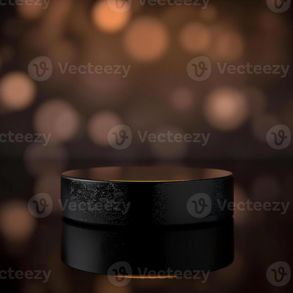 A black object on a table with a light behind it photo