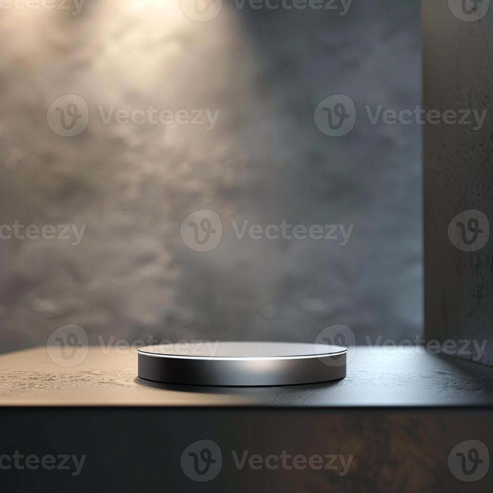 A silver object on a table in front of a wall photo
