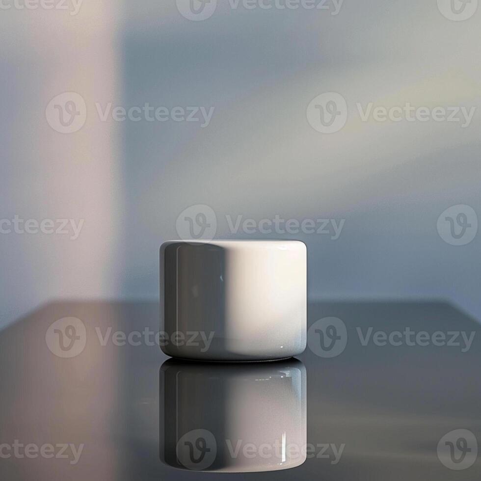 A white cup sitting on a table photo