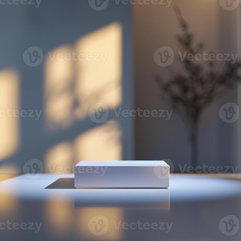A white box sitting on a table in front of a window photo