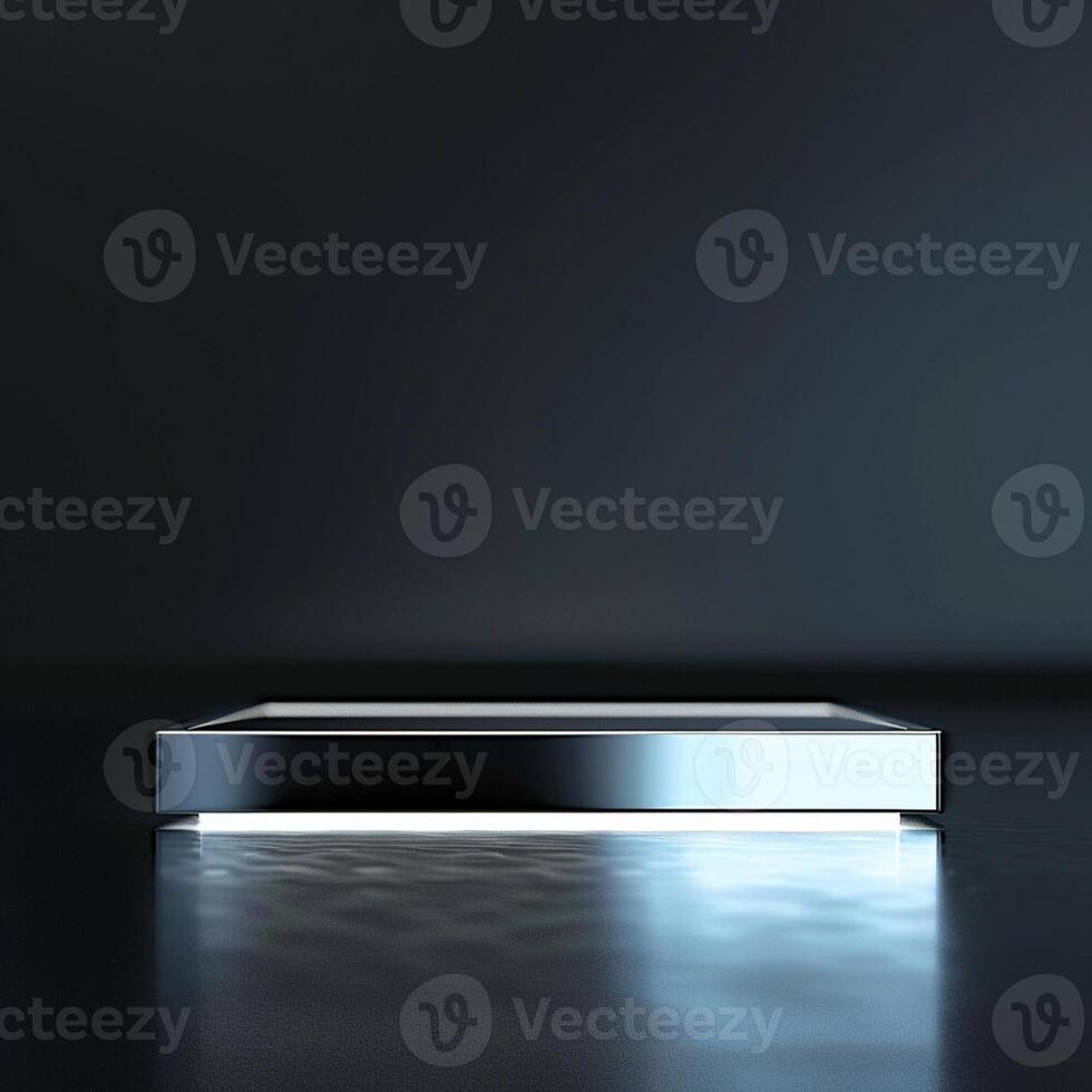 A silver rectangular table with a light shining on it photo