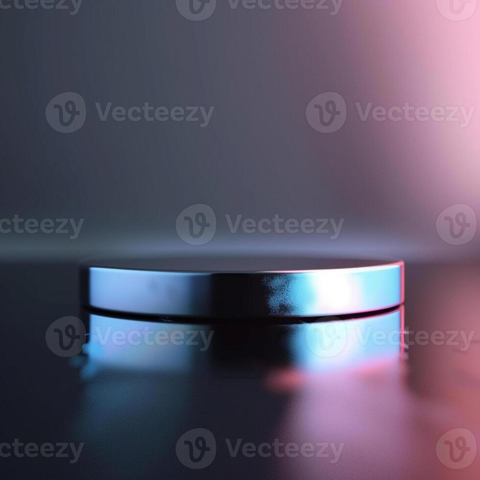 A shiny object on a table with a light behind it photo