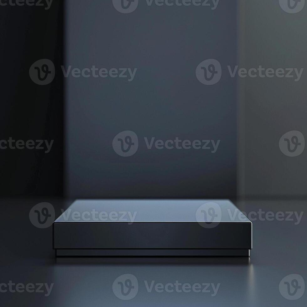 A black box sitting on a table in front of a wall photo