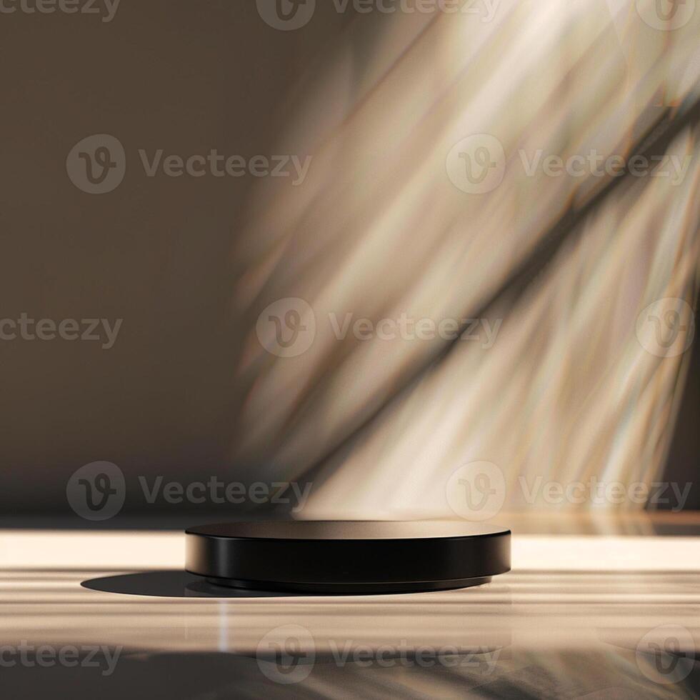 A black object sitting on a table in front of a wall photo