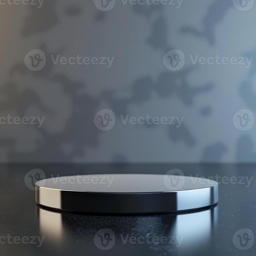 A black and white round table with a silver top photo