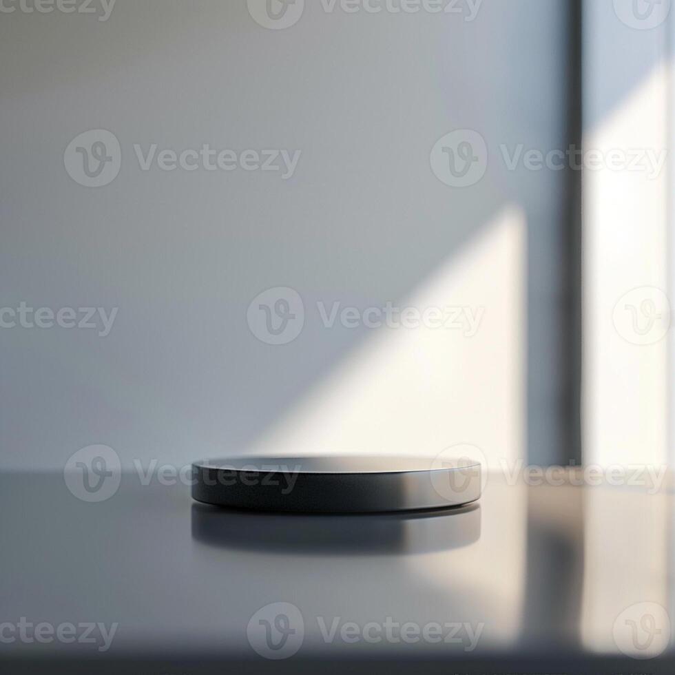 A small black object sitting on top of a table photo