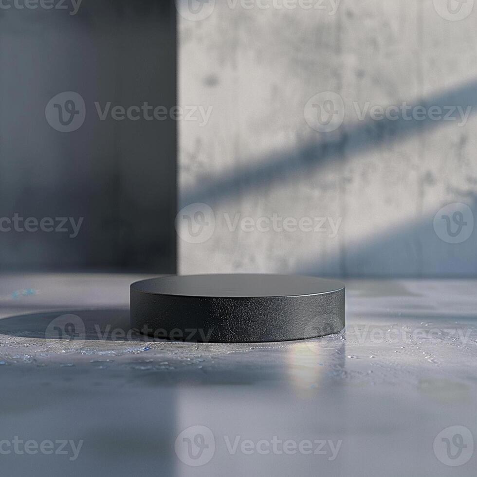 A black round object sitting on a concrete floor photo