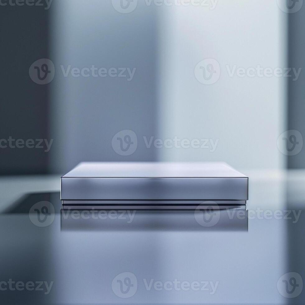 A silver box sitting on a table photo