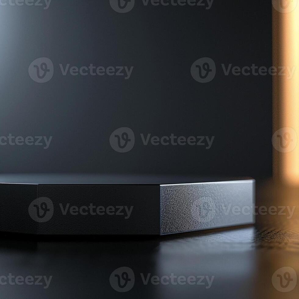 A black box sitting on a table in front of a light photo